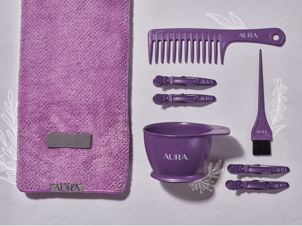 Laydown shot of the NEW line of AURA Hair Care accessories. Made with eco-friendly materials. 