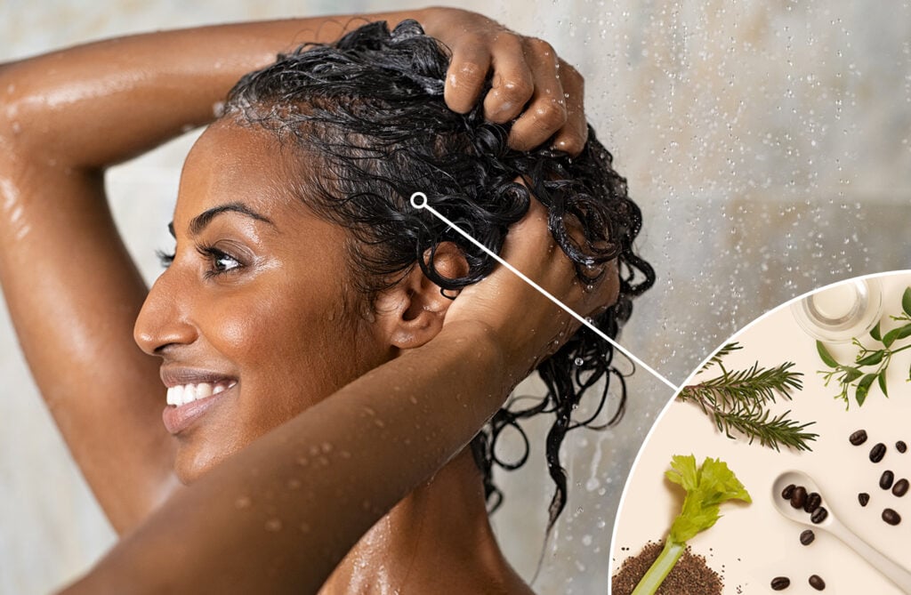 Woman of color with hands in her hair washing her curly hair with high-quality ingredients. 